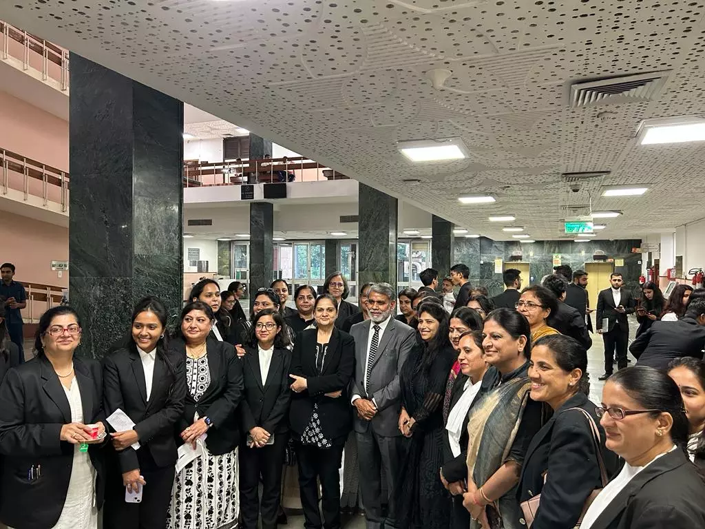 Justice Suresh Kumar Kait with lawyers of Delhi High Court Women Lawyers Forum